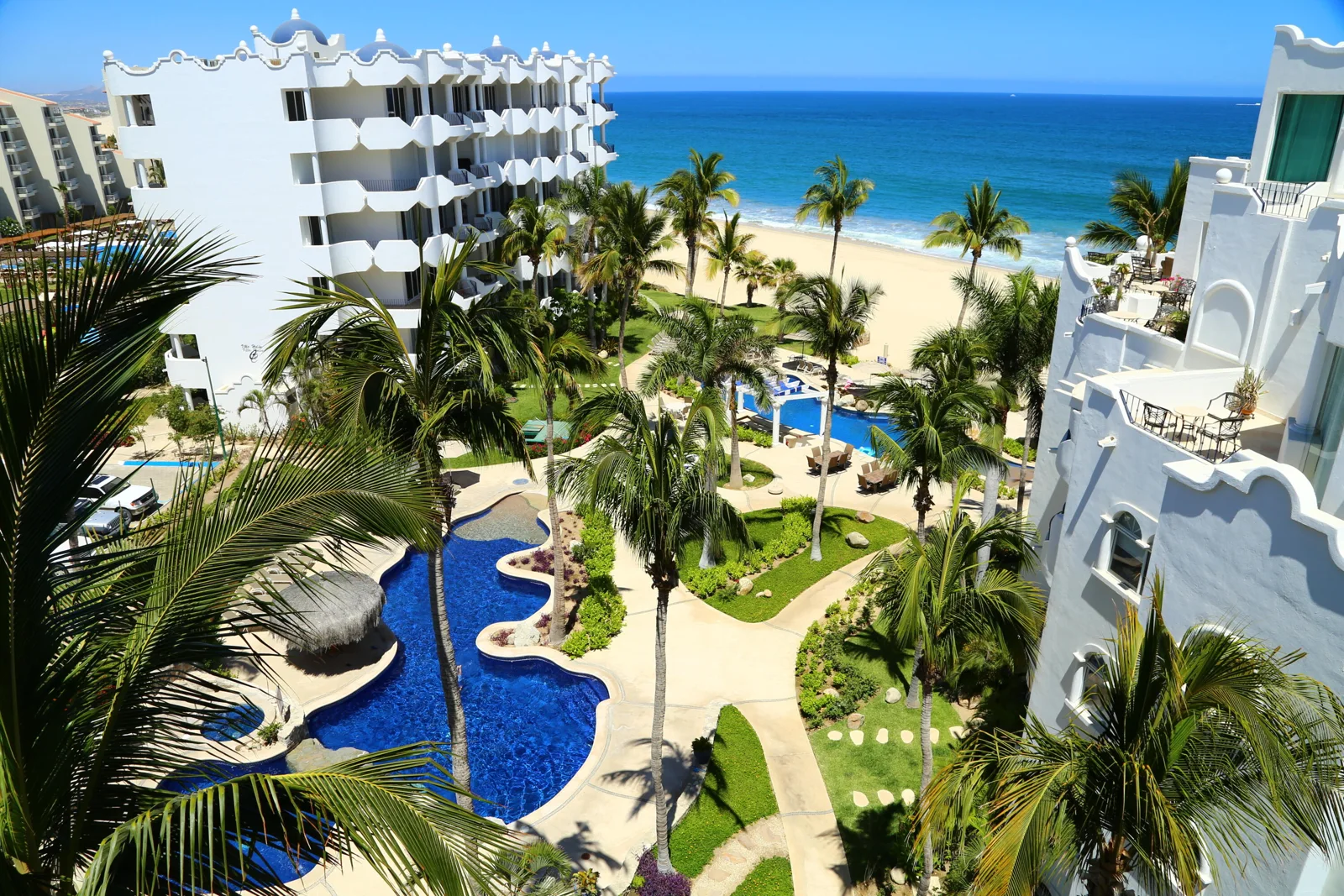 Mykonos condominiums, gardens and pool overlooking the beach in San José del Cabo